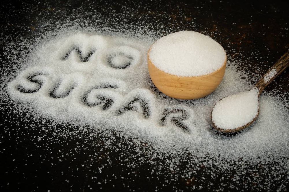 no-sugar-benefits-of-cutting-down-sugar-intake-sugar-in-a-spoon_1000x